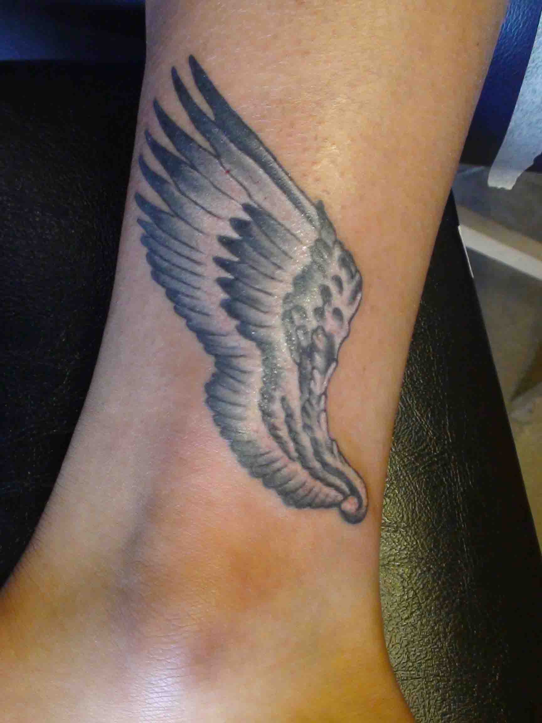 Wing tattoo by Shaun