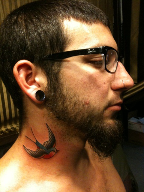 Sailor Jerry swallow neck tattoo by Vinse